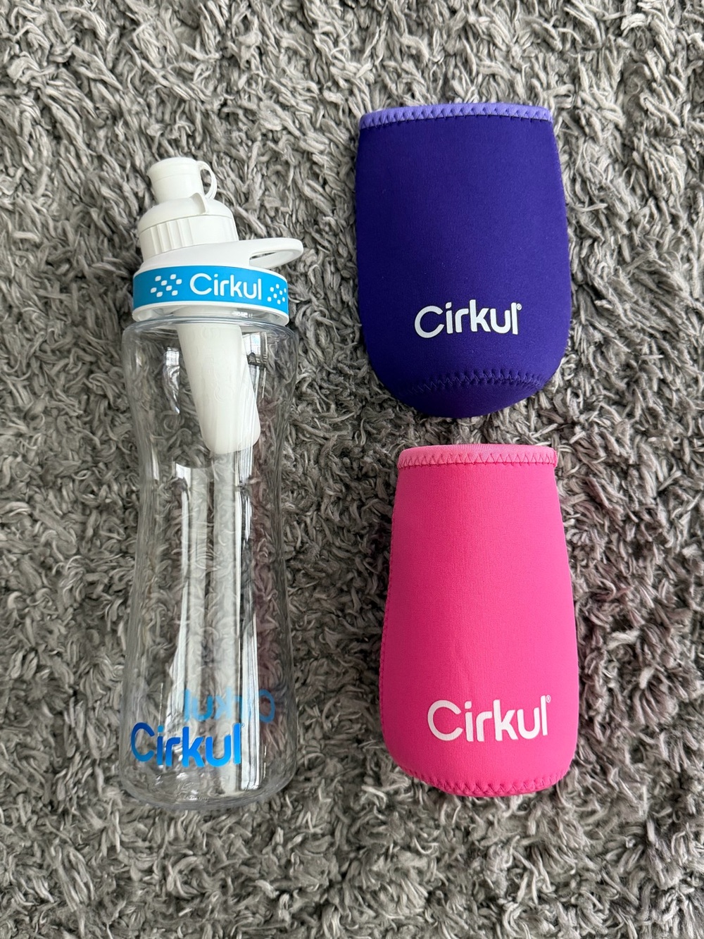 Cirkul Hydration Bottle with Purple and Pink Neoprene Sleeves